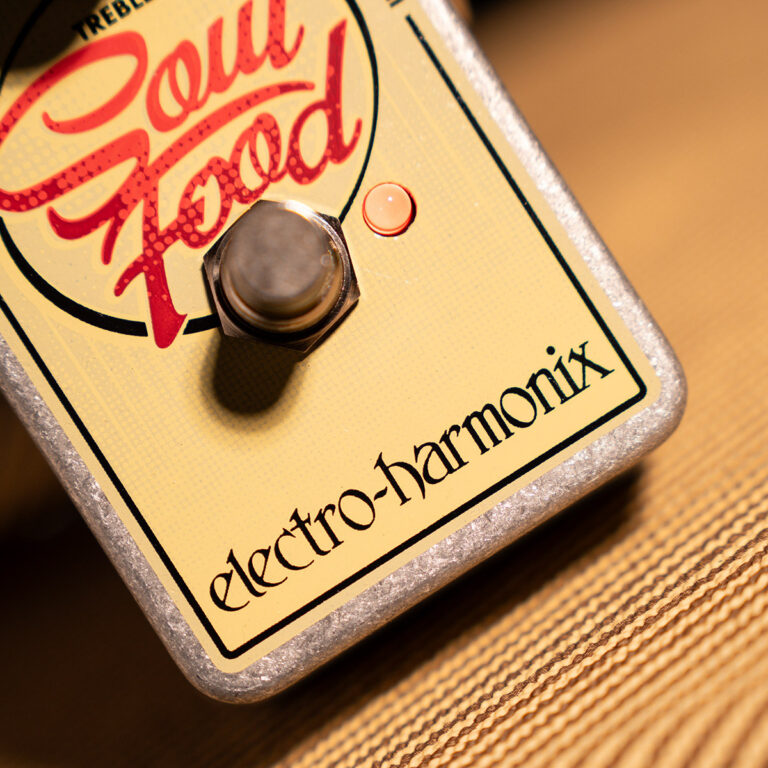 Close-up of an Electro-Harmonix Soul Food guitar effects pedal top panel, showing the red Soul Food logo, LED indicator, and footswitch. ขายราคาพิเศษ