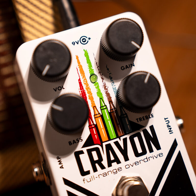 Crayon full-range overdrive guitar pedal with four black knobs and a colorful crayon graphic, input on the right side. ขายราคาพิเศษ
