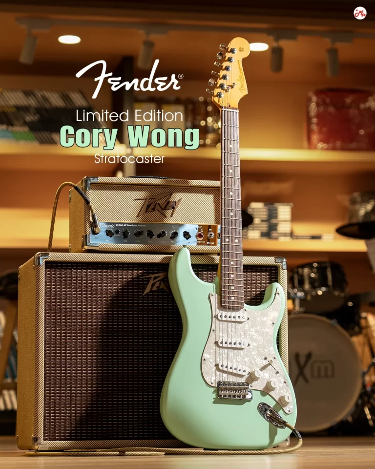 Promotional image for Fender Limited Edition Cory Wong Stratocaster: mint-green guitar resting on a vintage amplifier in a music shop display. ขายราคาพิเศษ