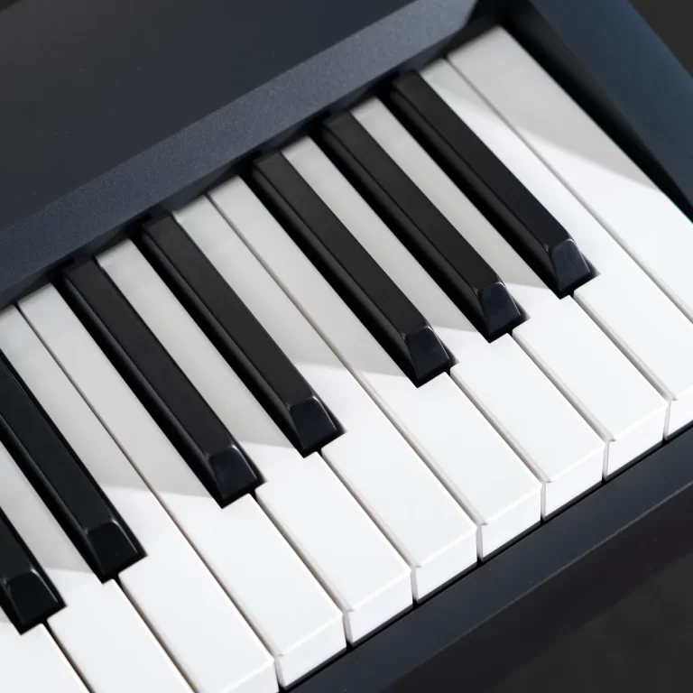 Close-up of black and white piano keys at an angle on a keyboard photo ขายราคาพิเศษ