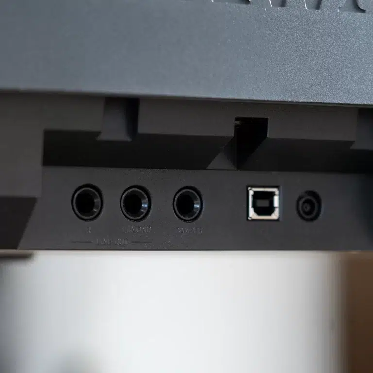 Rear panel of a device with three 3.5 mm audio jacks labeled Line In and two others, plus an Ethernet port and a power input. ขายราคาพิเศษ