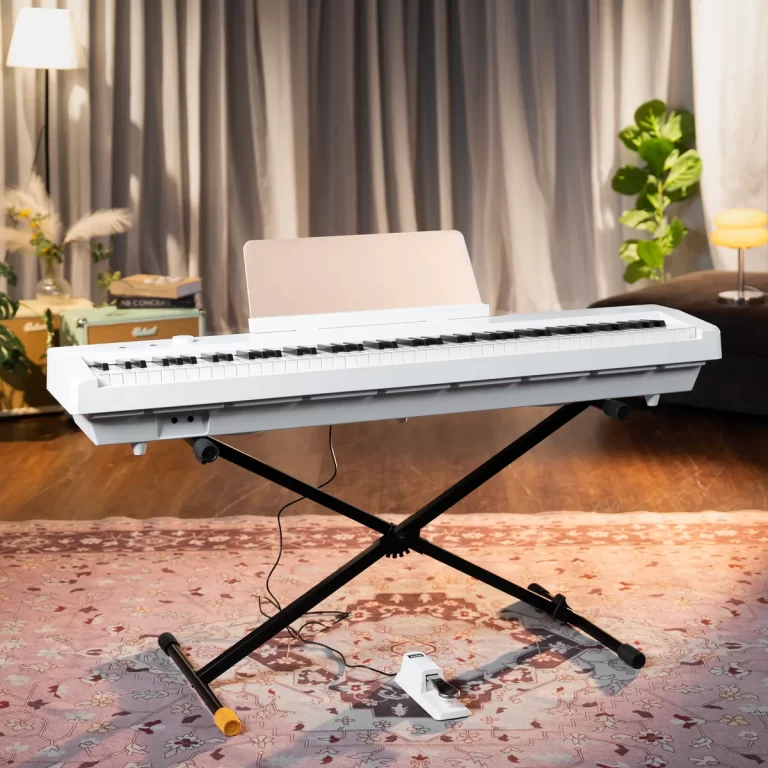 White electronic keyboard on a black X-style stand in a cozy living room with a pedal on the floor and a patterned rug. ขายราคาพิเศษ