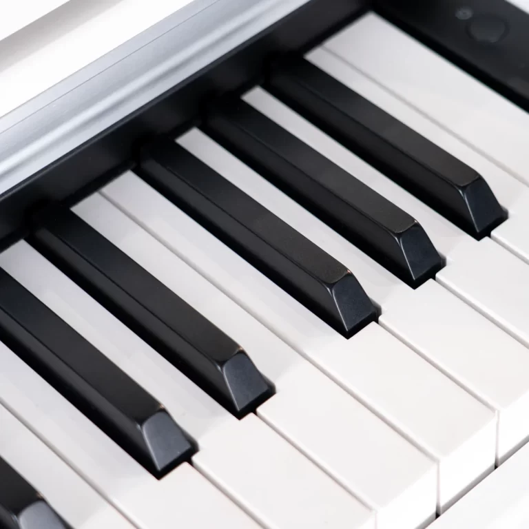 Close-up of black and white piano keys at an angle on a keyboard ขายราคาพิเศษ