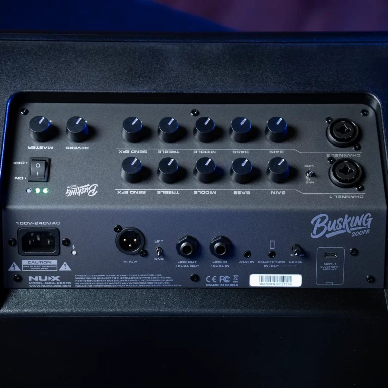 Rear panel of a Busking 200FR amplifier showing two rows of knobs, power switch, and various I/O jacks (DI OUT, LINE OUT, AUX IN, Bluetooth module). ขายราคาพิเศษ