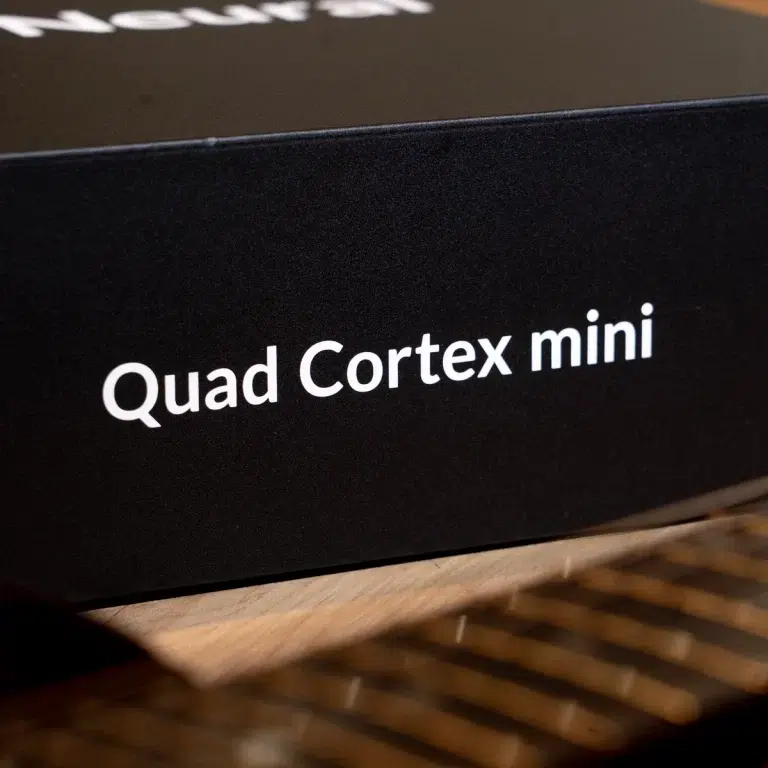 Box with black packaging labelled 'Quad Cortex mini' in white text, close-up image. ขายราคาพิเศษ