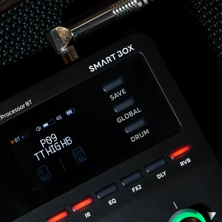 Close-up of a black SMART BOX multi-effects processor with a color display and buttons labeled SAVE, GLOBAL, DRUM. ขายราคาพิเศษ