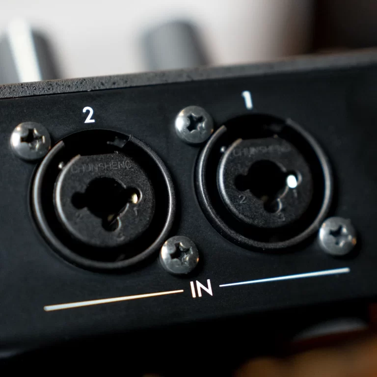 Two XLR input jacks labeled 1 and 2 on a black panel with an IN indicator below. ขายราคาพิเศษ