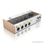 Wooden‑sided studio audio interface with multiple input jacks, knobs, and green LED indicators for input activity and levels (www.musicarms.net watermark) ลดราคาพิเศษ