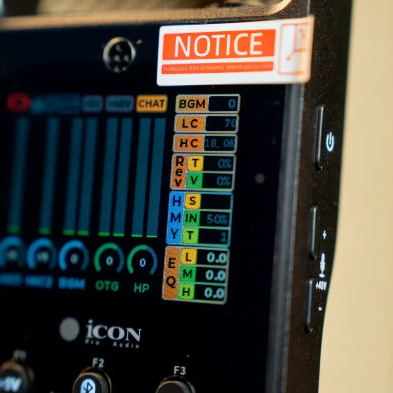 Close-up of an airplane cockpit panel showing colorful status blocks (BGM, LC, HC, RT, etc.) and a prominent NOTICE sticker above the display. ขายราคาพิเศษ