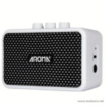 White compact portable speaker with a black mesh grille and three white knobs on top, Aroma branding visible on front. ขายราคาพิเศษ