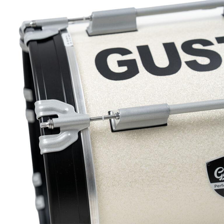Close-up of a beige drum with silver hardware and clamps along the edge. ขายราคาพิเศษ