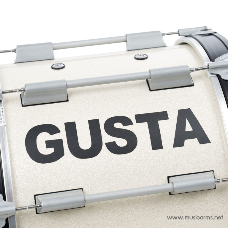 Close-up of a beige glitter drum shell with grey hardware and the large word 'GUSTA' on it. ขายราคาพิเศษ