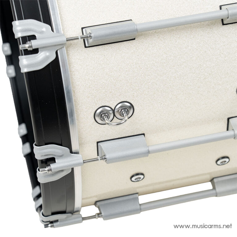 Close-up of a beige drum shell showing silver tension rods and lugs along the rim and part of the hardware mount. ขายราคาพิเศษ