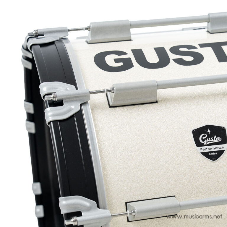 Close-up of a beige Gusta snare drum with silver lugs and hardware. ขายราคาพิเศษ