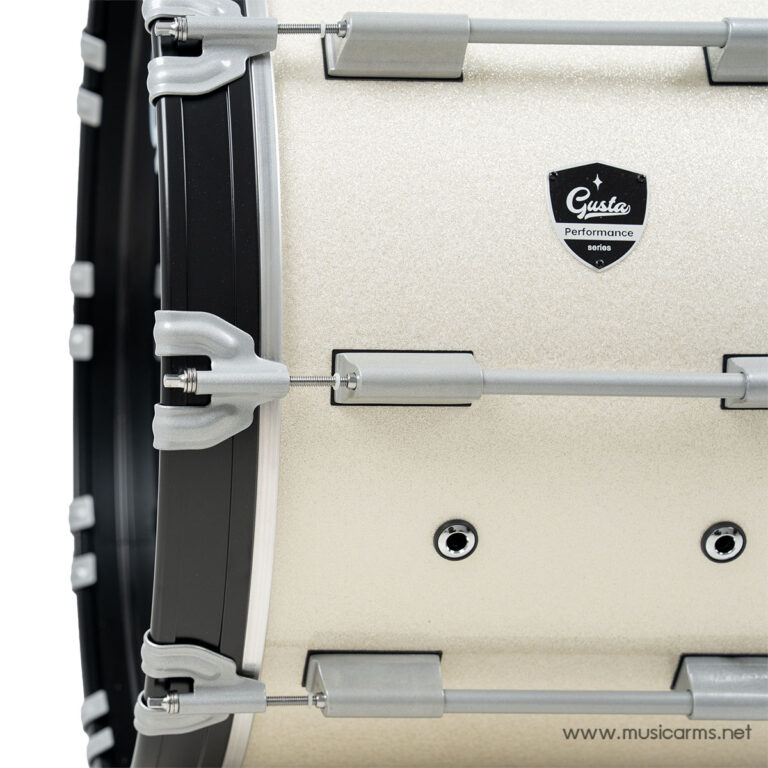 Close-up of a beige drum shell with chrome hardware and the Gusta Performance badge. ขายราคาพิเศษ