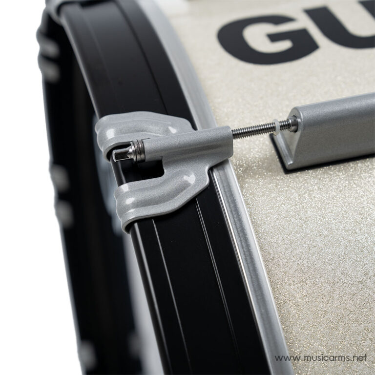 Close-up of a drum with a silver tension clamp securing the drum head. ขายราคาพิเศษ