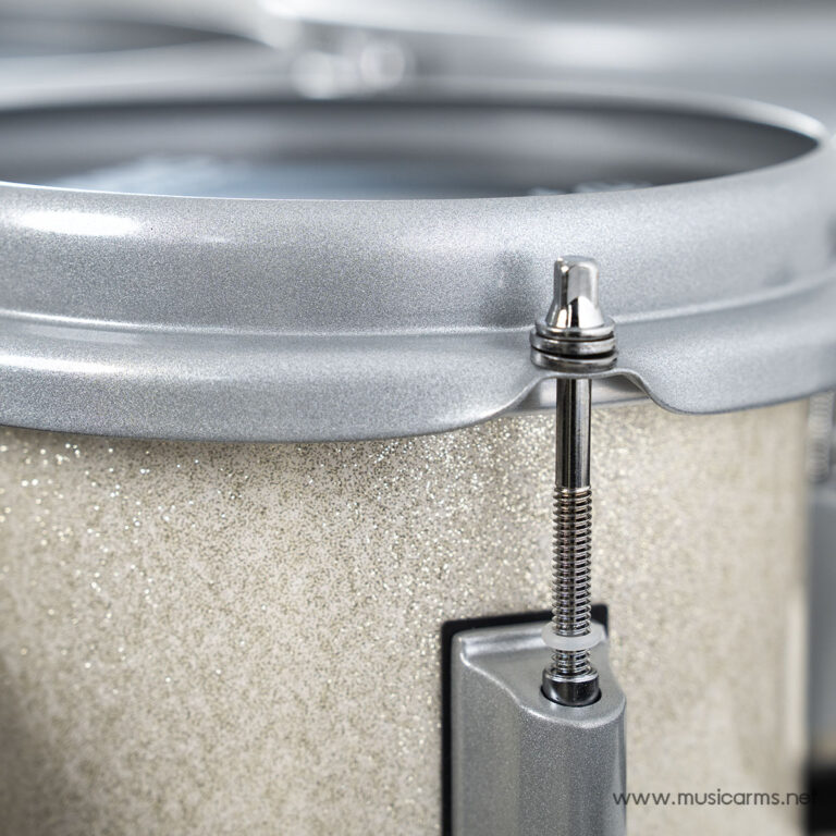 Close-up of a textured silver drum shell with a chrome tension rod and hoop clamp securing the rim. ขายราคาพิเศษ