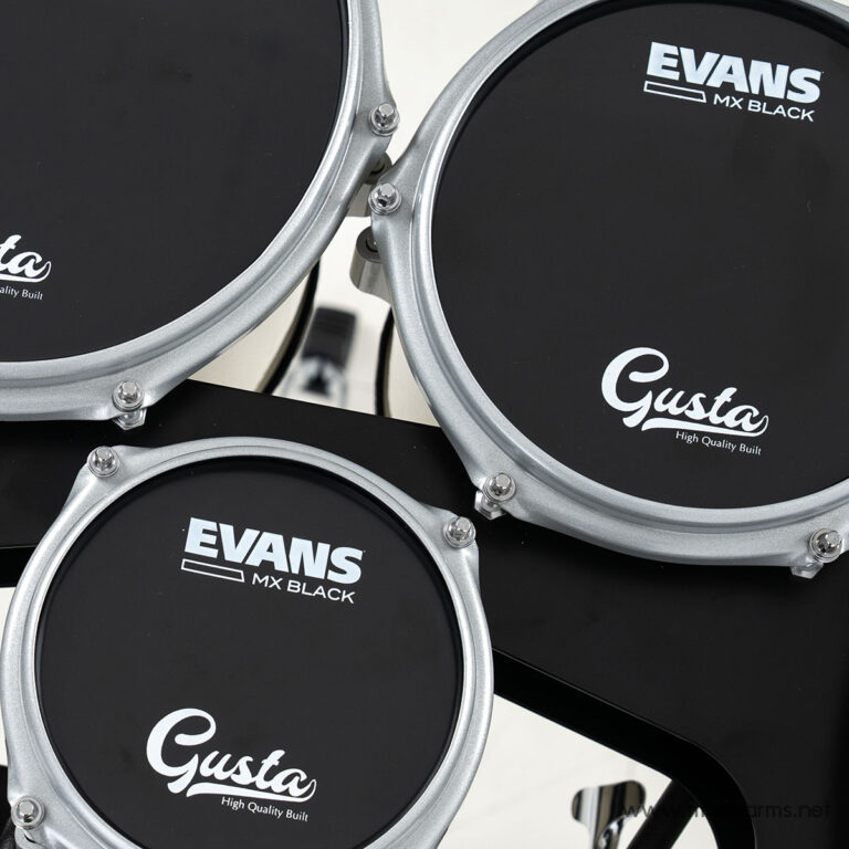 Close-up of black drum pads with silver rims showing Evans MX Black and Gusta logos. ขายราคาพิเศษ