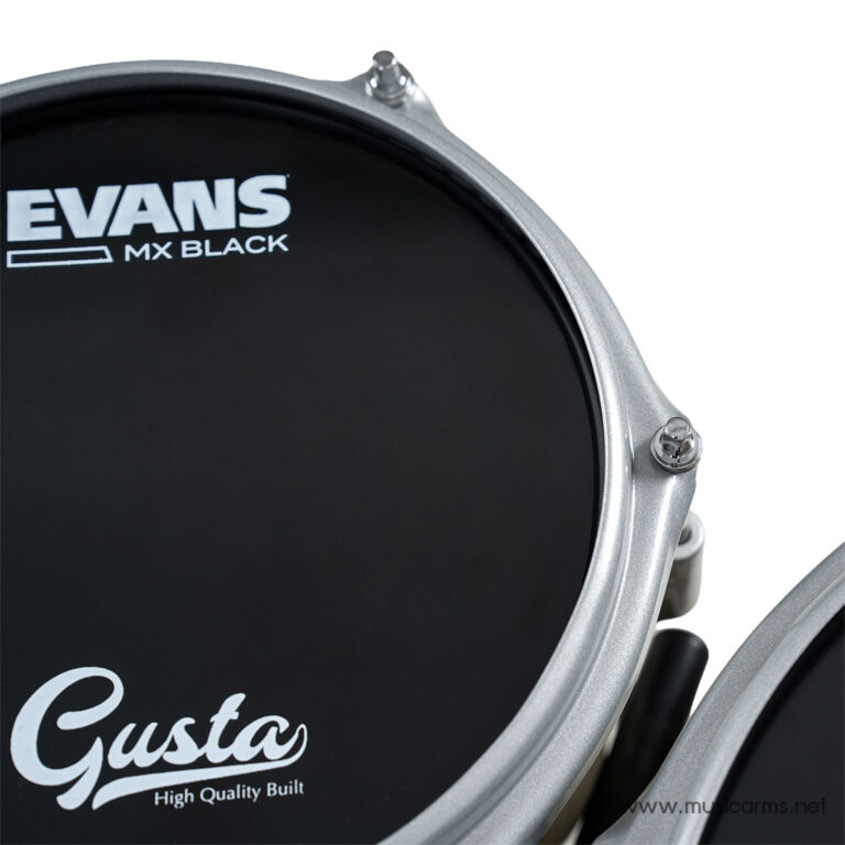 Close-up of a black drum head with Evans MX Black branding and the Gusta logo on a silver rim. ขายราคาพิเศษ