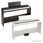 Two digital pianos side by side: a black upright model behind a white console keyboard with pedals visible below ลดราคาพิเศษ