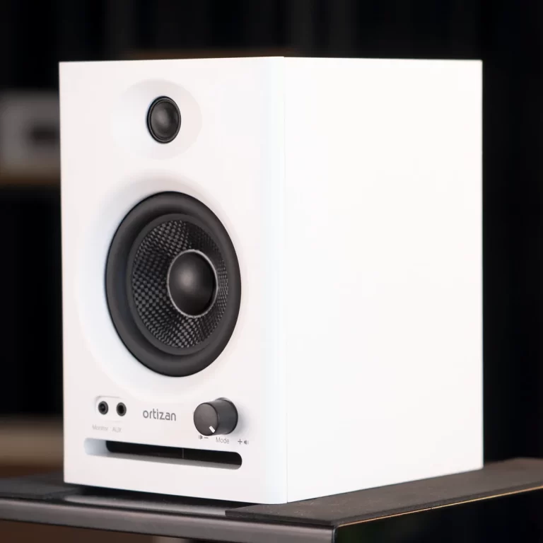 White Ortizan speaker with a large black woofer, a small tweeter above, and front-panel controls visible at the bottom. ขายราคาพิเศษ