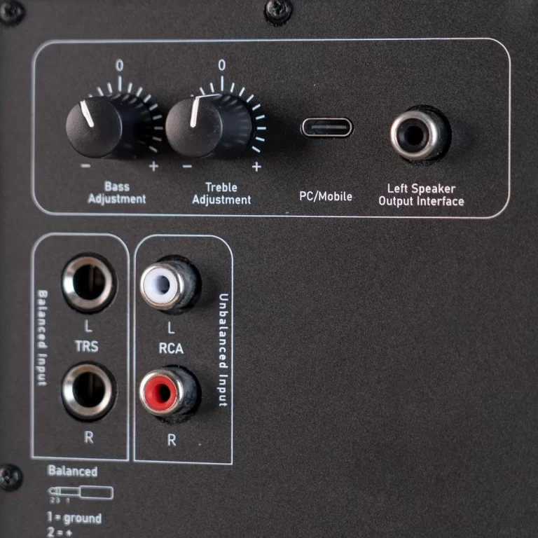Rear panel with Bass and Treble adjustment knobs, USB-C PC/Mobile input, and left speaker output jack; other inputs visible below are L TRS balanced and L/R RCA. ขายราคาพิเศษ