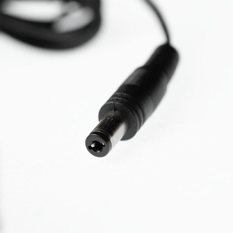 Close-up of a black DC barrel power connector plug on a white background. ขายราคาพิเศษ