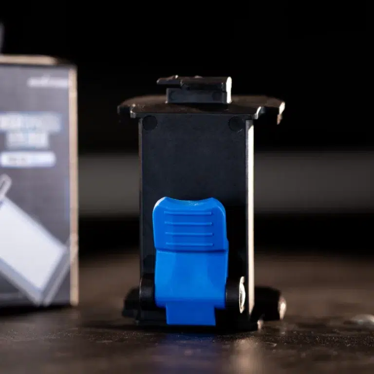 Close-up of a blue lever-style power switch on a black electrical module. ขายราคาพิเศษ