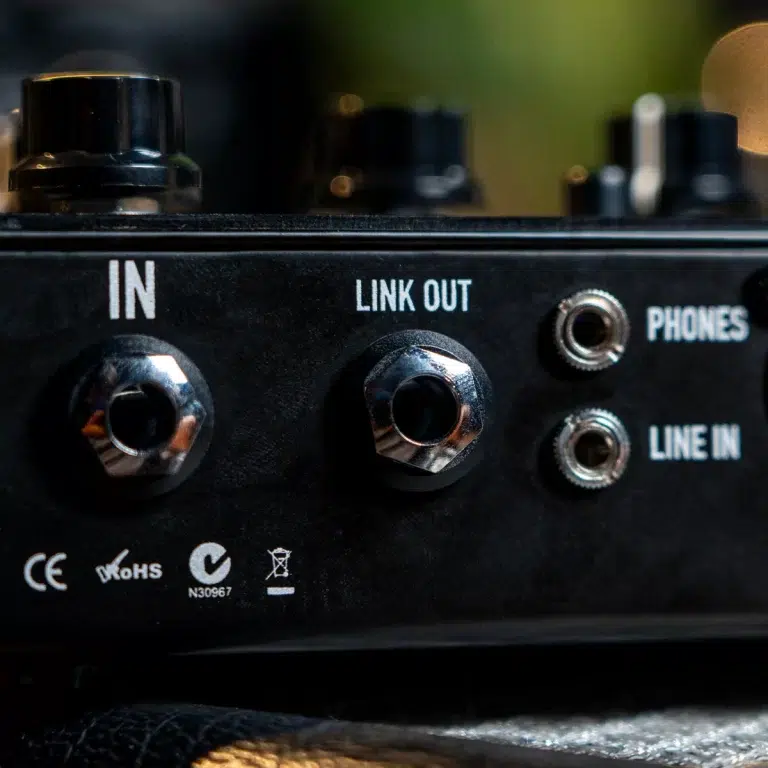 Close-up of an audio device panel showing IN and LINK OUT jacks, plus PHONES and LINE IN ports ขายราคาพิเศษ