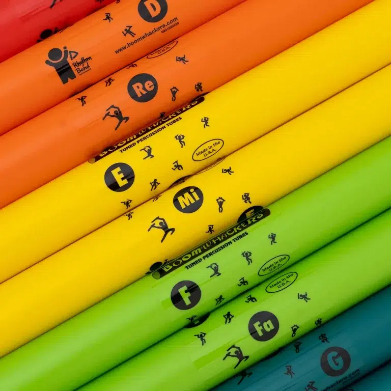 Rainbow Boomwhackers tuned percussion tubes stacked in a red-to-blue rainbow sequence. ขายราคาพิเศษ