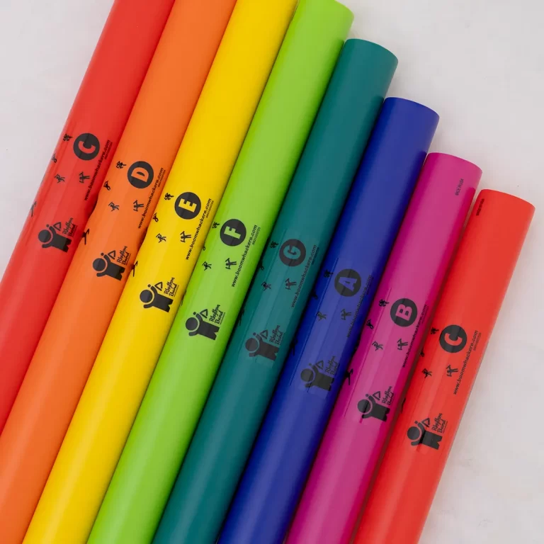 Row of neon-colored markers arranged diagonally from red to red-orange, yellow, green, teal, blue, purple, and pink on white background, showing labels. ขายราคาพิเศษ