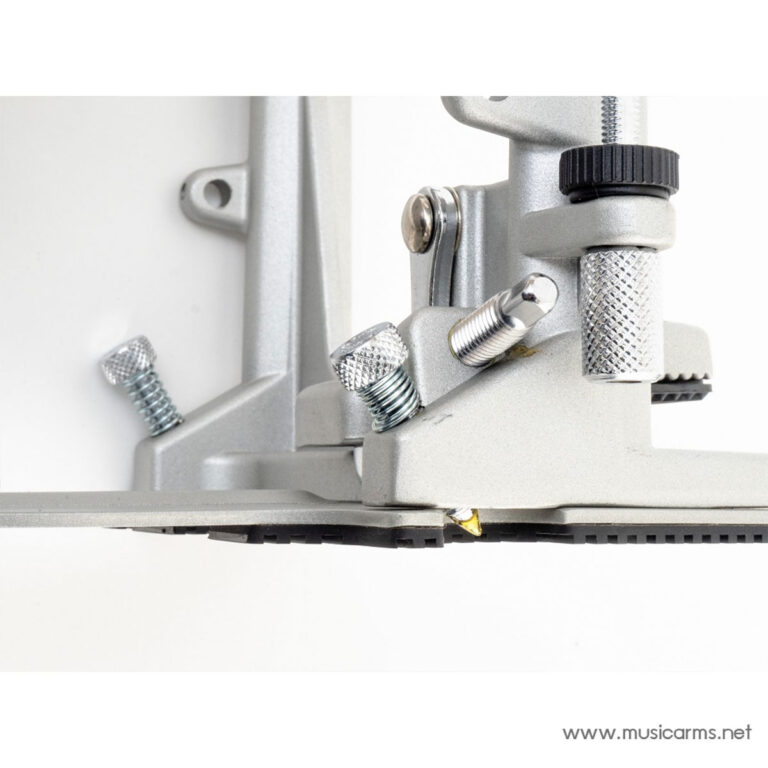 Close-up of a metallic clamp with knurled screws and an adjustment knob on a precision tool component ขายราคาพิเศษ