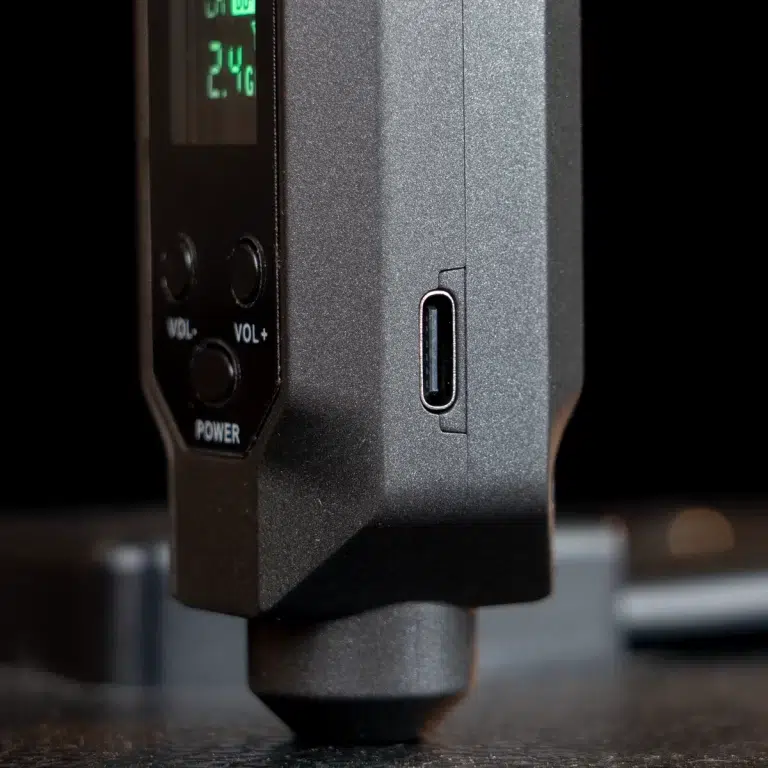 Close-up of a black rugged device showing a USB-C port on the side, with a power button and volume controls visible on the front panel. ขายราคาพิเศษ