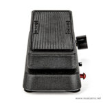 Side view of a black guitar effects pedal with a ridged top surface, textured housing, and a small red indicator LED on the right side ขายราคาพิเศษ