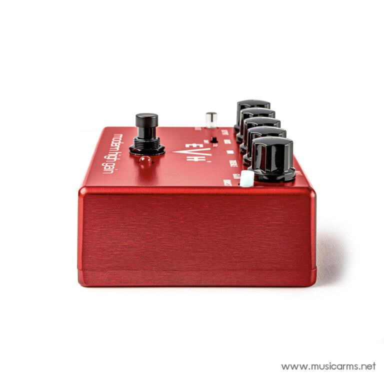 Close-up of a red guitar effects pedal with multiple black knobs and a footswitch on top against a white background, watermark musicarms.net on the corner. ขายราคาพิเศษ