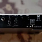 Back panel of an audio device showing connections: EXP, AUX IN, MIDI IN, NBT-1, USB, DC IN, and a power switch; headphones and MIDI OUT jacks labeled PHONES and MIDI OUT. ขายราคาพิเศษ