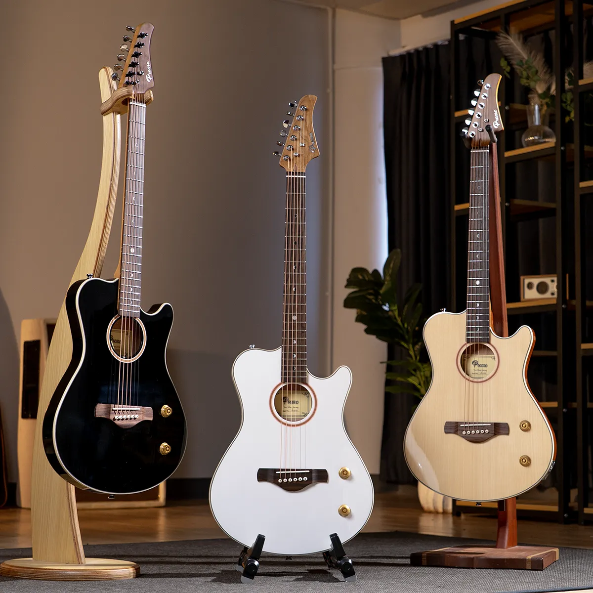 Three electric/acoustic guitars on stands in a showroom: black cutaway on left, white semi-acoustic in center, natural wood cutaway on right with shelving and plant in background