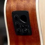 Close-up of a guitar's built-in preamp on a wooden body, showing Bass, Middle, Treble, Volume and tuner controls ขายราคาพิเศษ