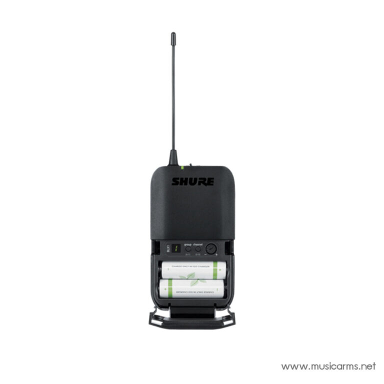 Shure wireless microphone transmitter with a long antenna and an open battery compartment showing two AA batteries inside. ขายราคาพิเศษ