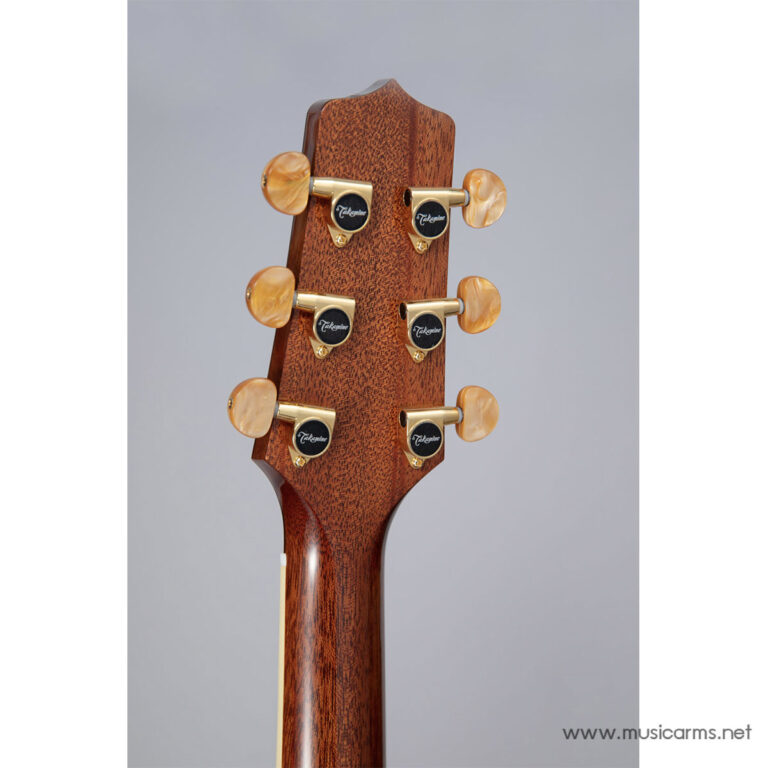 Back of a guitar headstock with six gold tuners and peach-colored knobs on a reddish-brown neck against a gray background.” ขายราคาพิเศษ