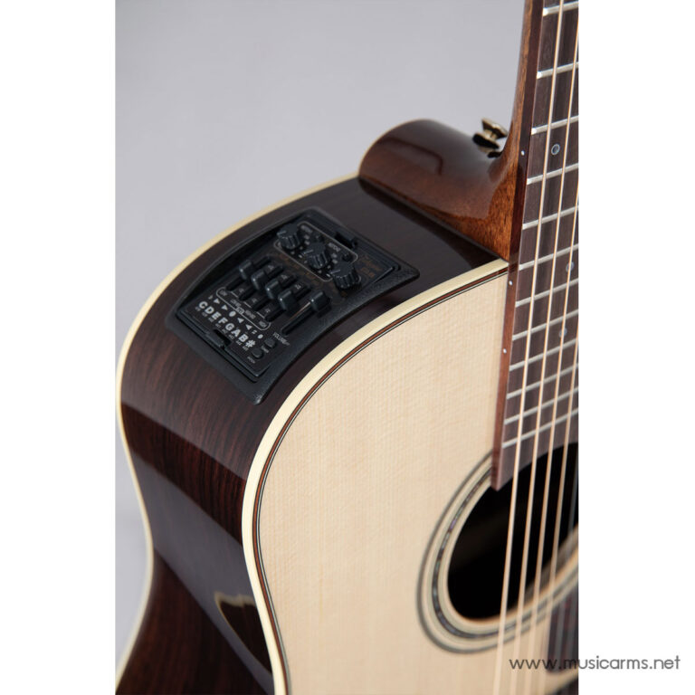 Acoustic guitar with a built-in preamp panel on the side, showing control knobs and buttons. ขายราคาพิเศษ