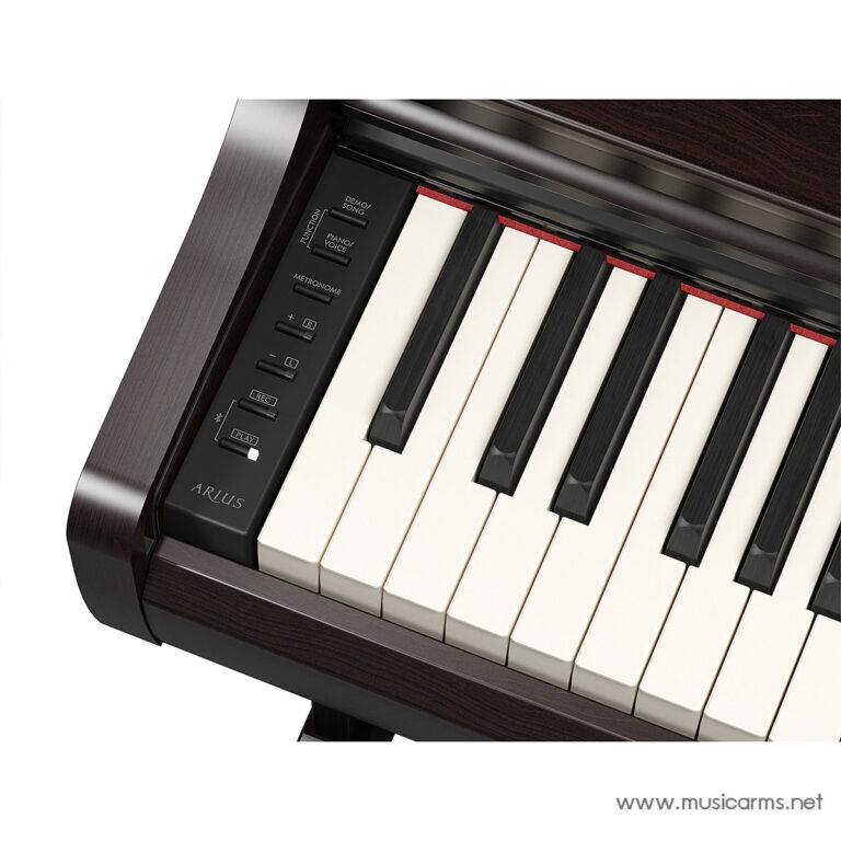 Close-up of a wooden upright piano keyboard with white and black keys; control panel on the left. ขายราคาพิเศษ