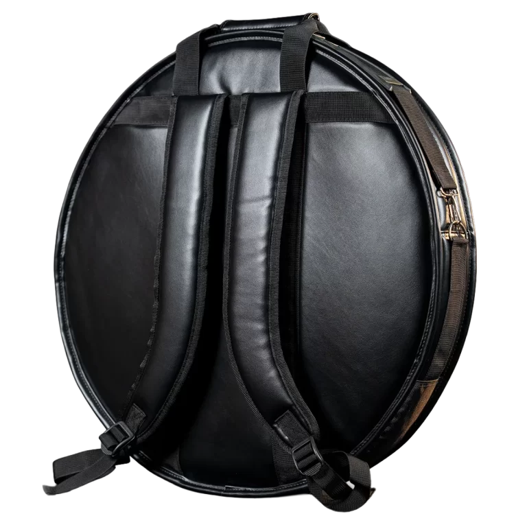Black circular backpack with padded shoulder straps, viewed from the back. ขายราคาพิเศษ