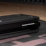 Close-up of a black professional audio system rack with the label 'Professional Audio System' on the front panel. ลดราคาพิเศษ