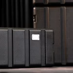Close-up of a black rugged protective case with a small white oval label reading ARMOR. ขายราคาพิเศษ