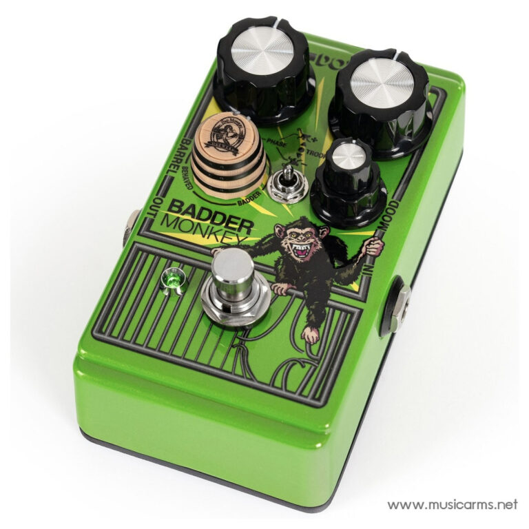 Green guitar effects pedal labeled 'Badder Monkey' with multiple black knobs and a monkey graphic on the face, used to alter guitar tone. ขายราคาพิเศษ