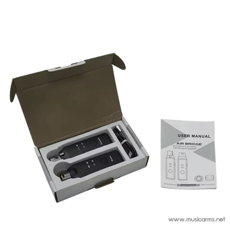 Wireless microphone system in open box with two handheld units and accessories, plus user manual nearby ขายราคาพิเศษ
