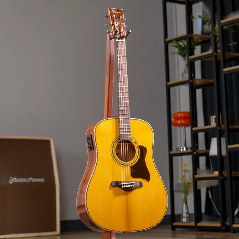 Acoustic guitar with a natural wood finish on a stand in a room, with shelves and plants in the background. ขายราคาพิเศษ