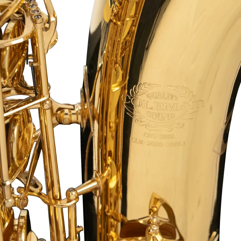 Close-up of a polished gold saxophone showing keys and rods with an engraved logo on the body, highlighting craftsmanship. ขายราคาพิเศษ