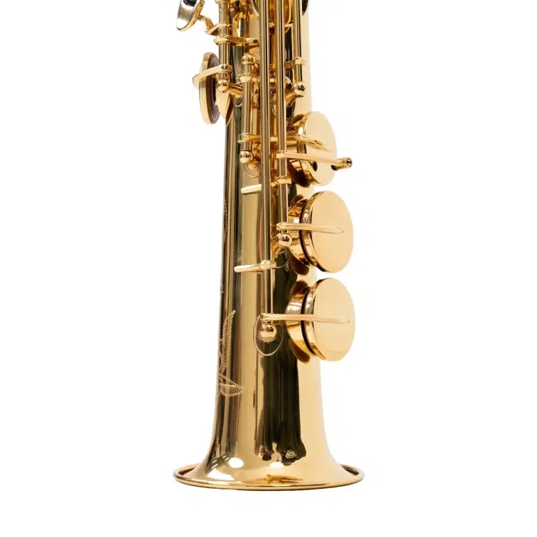 Close-up side view of a shiny gold saxophone showing the keys and pads against a white background ขายราคาพิเศษ